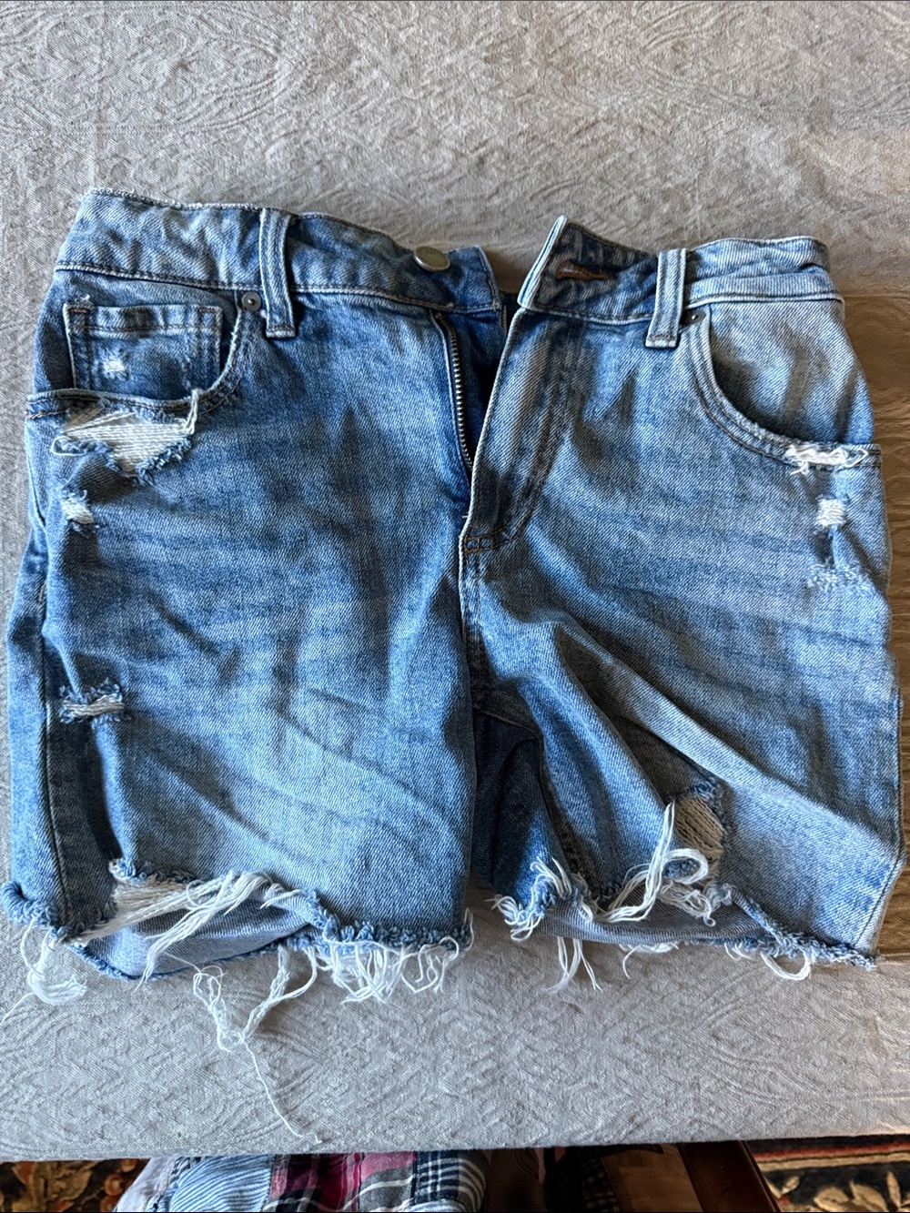 PAIGE Light Blue Distressed Denim Cutoff Shorts